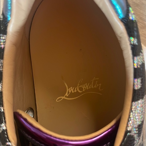 Black & Purple Women's Sneakers
made in Paris by Christian LOUBOUTIN
Red bottom - Picture 6 of 16